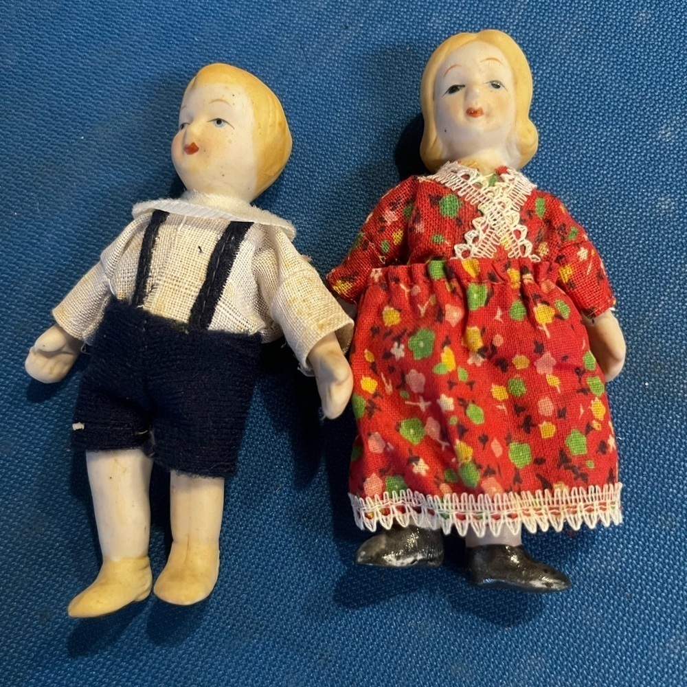 Vintage set of 2 small bisque doll hinged legs boy & girl